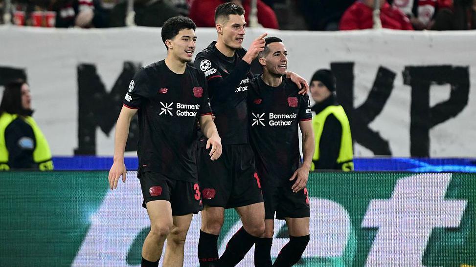 Patrik Schick celebrates with his Bayer Leverkusen team-mates