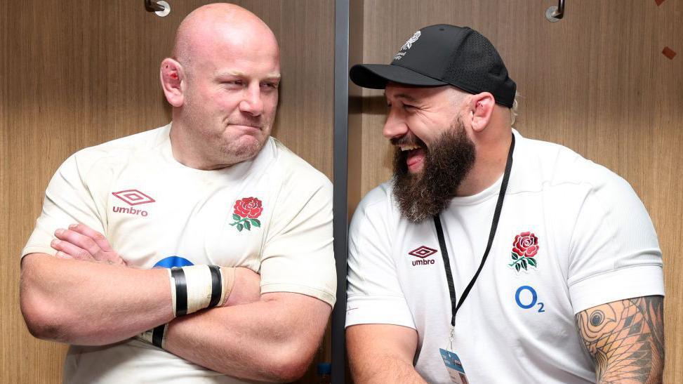 Dan Cole and Joe Marler smile in the changing room