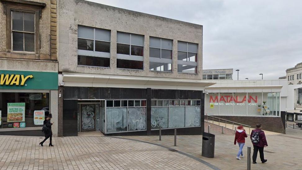 A Google street view image showing a vacant two-storey property in Wolverhampton city centre next to a Subway restaurant to the left and a Matalan on the right.