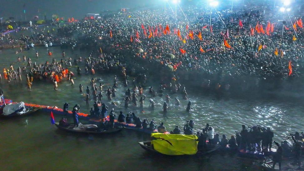 Huge crowds of devotees seen along the banks of Sangam as millions attend the Mahakumbh mela in Prayagraj city