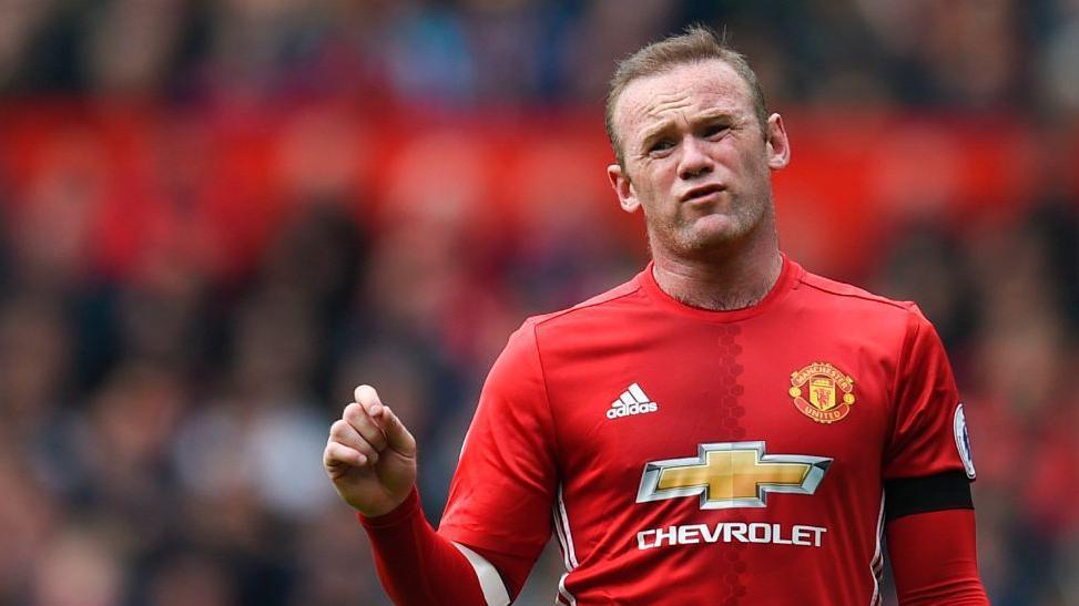 Wayne Rooney wearing a Manchester United kit