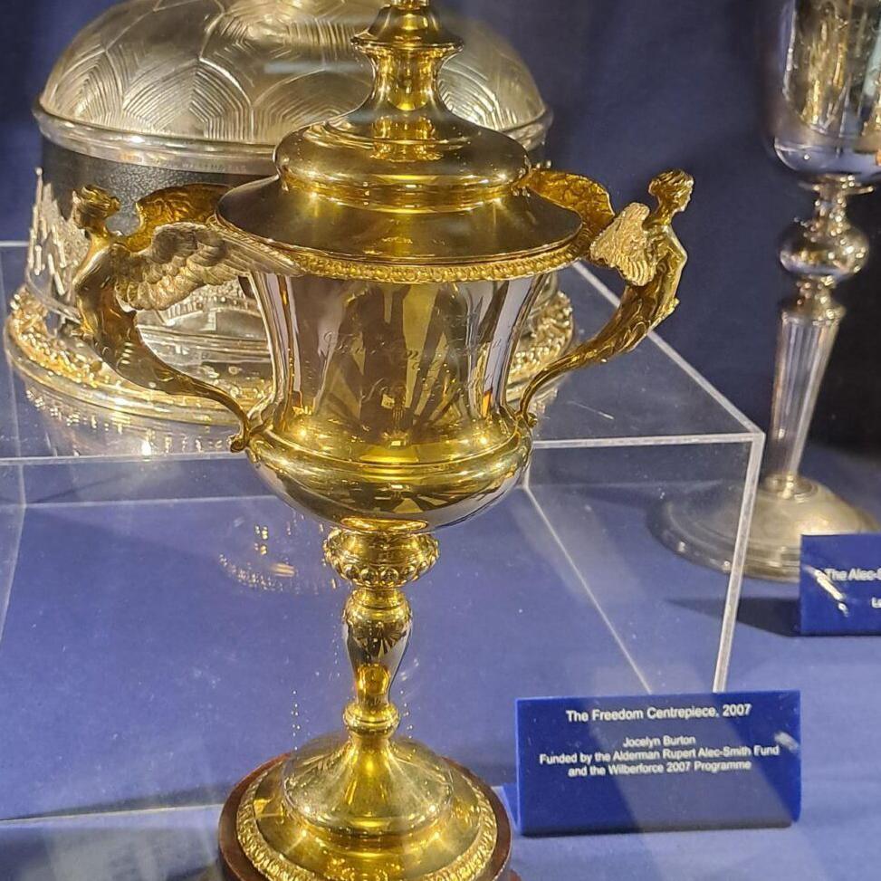 The ornate gold cup with winged figures on the handles in a display case at the Guildhall in Hull.