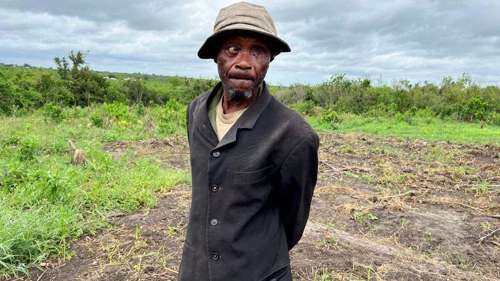 A man standing in a field