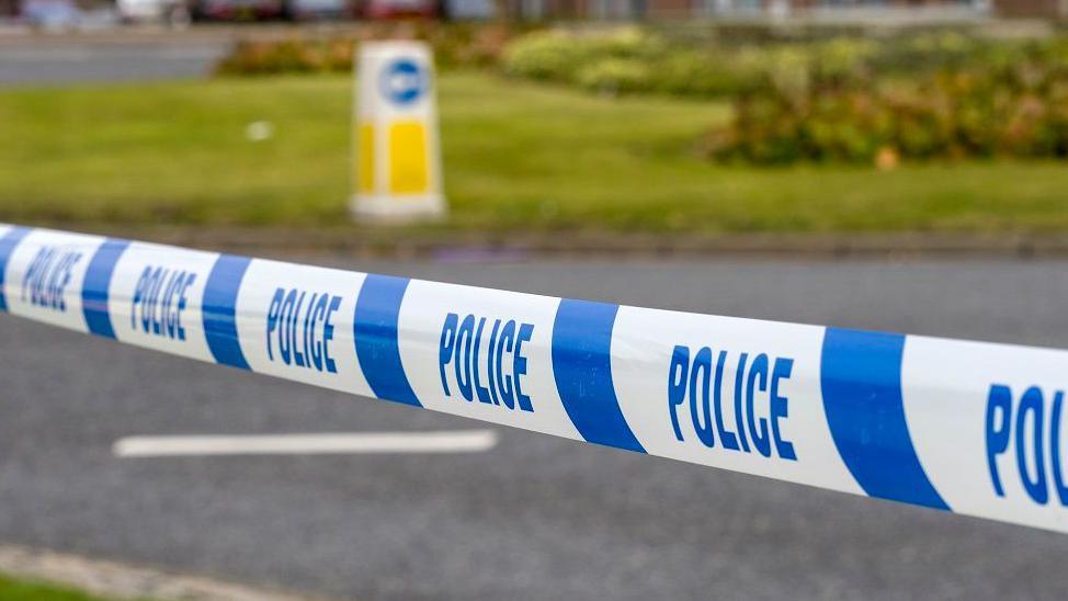 Stock image of a police cordon on what appears to be a motorway
