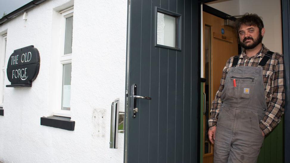 Old Forge manager Will O'Neill at the door to the pub