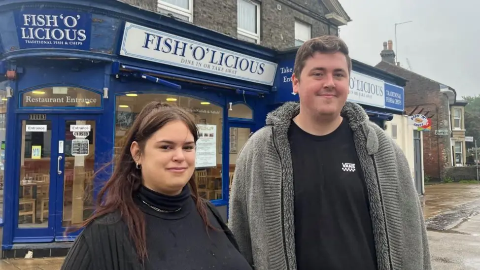 Tom Howes and Dory Czicza outside Fish'O'Licious in Great Yarmouth.