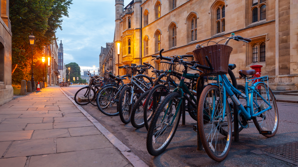 Cambridge city centre showing a row of parked pedal bikes