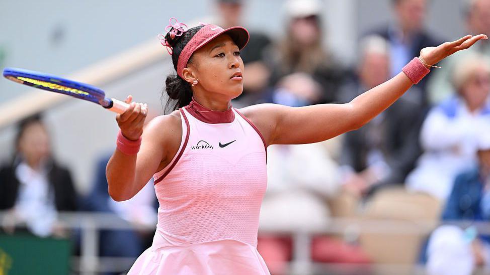 Naomi Osaka reacts after a point in her French Open first round match