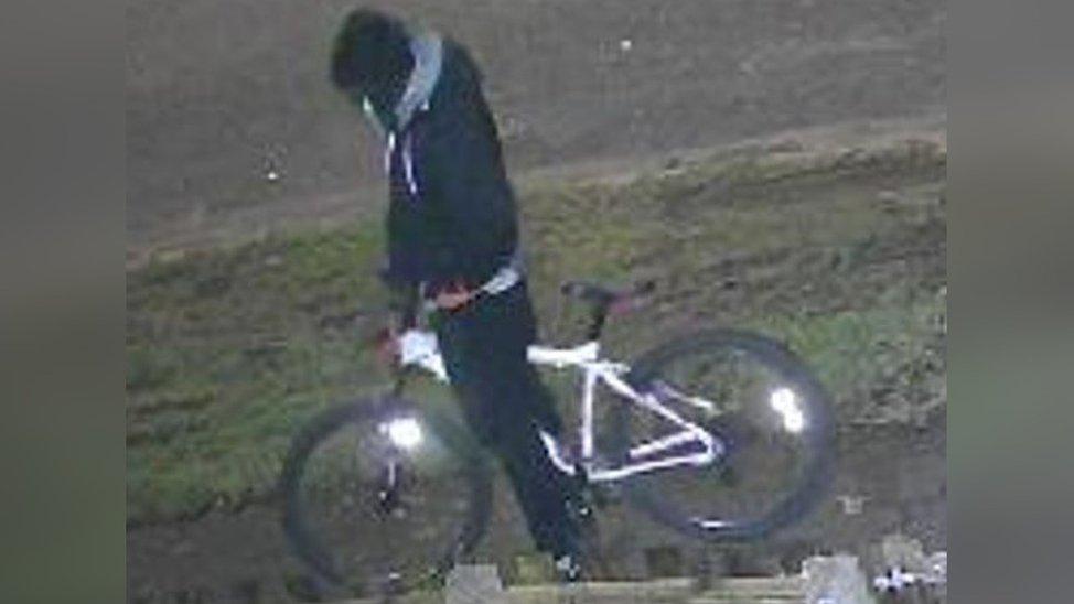 CCTV image of person on a bike