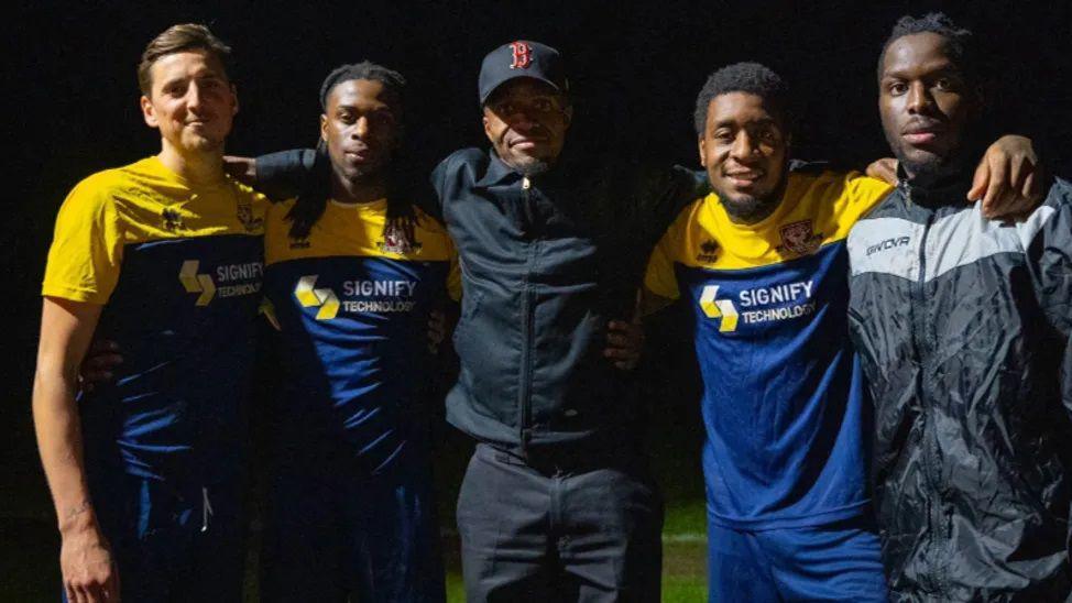 Wilfried Zaha pictured with AFC Croydon Athletic players