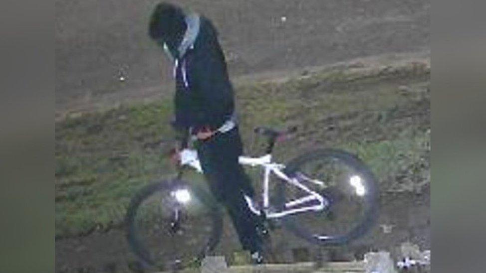 CCTV image of person on a bike