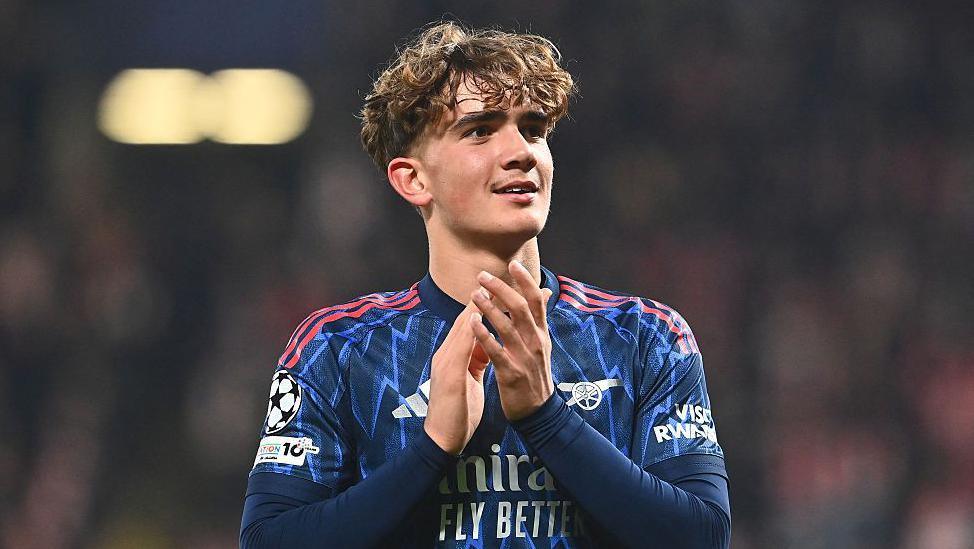 Max Dowman claps supporters. 