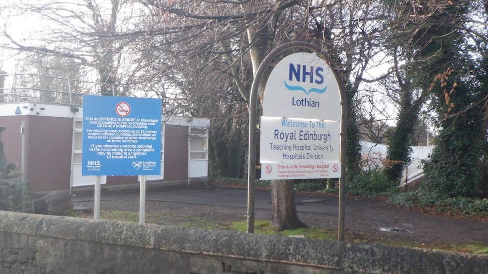 A sign, surrounded by trees, that says welcome to Royal Edinburgh Hospital