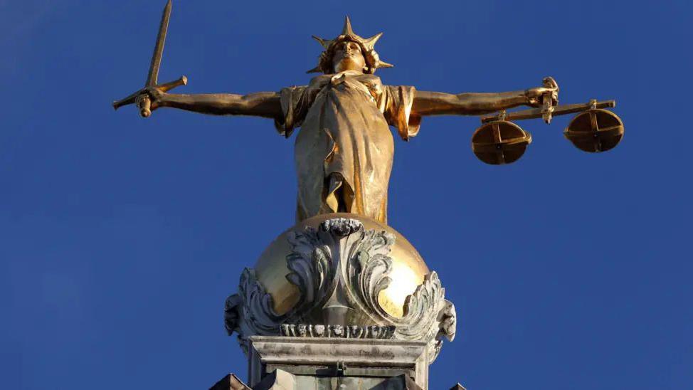 The Lady Justice statue on top of the Old Bailey