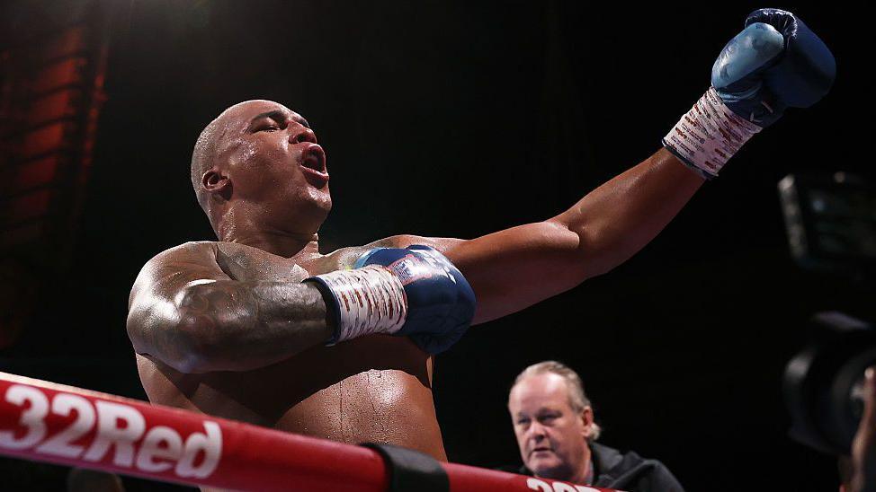 Fabio Wardley celebrates in the ring