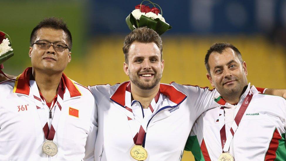 Aled Sion Davies (centre) with silver medallist Guofeng Kang of China and Dechko Ovcharov of Bulgaria who won bronze