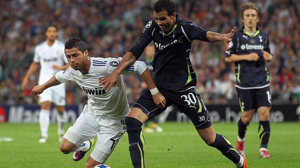 Sandro battles with Cristiano Ronaldo during a Champions League quarter-final between Tottenham and Real Madrid in 2011