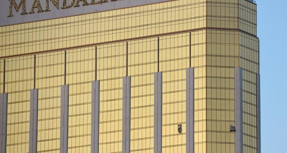 Broken windows on the 32nd floor of the Mandalay Bay Hotel