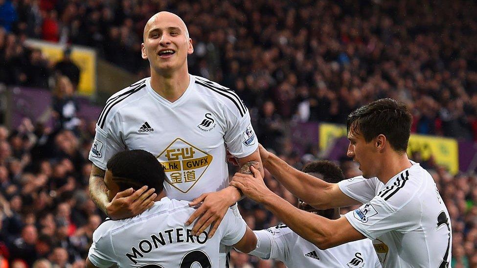 Jonjo shelvey celebrates scoring for Swansea City