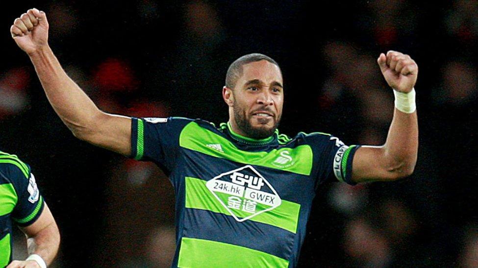 Ashley Williams celebrates Swansea's win over Arsenal