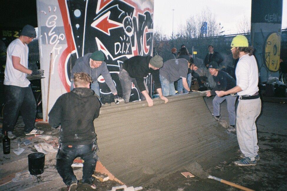 skaters building a ramp