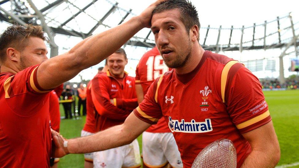 Justin Tipuric is congratulated by his team-mates after Wales' 16-10 win over Ireland