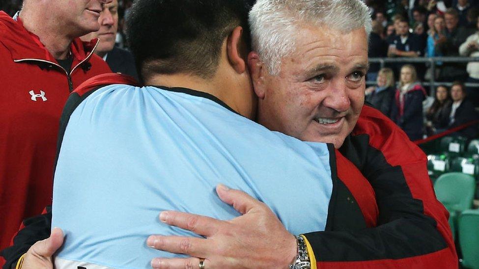 Warren Gatland hugs a member of the Wales rugby medical team