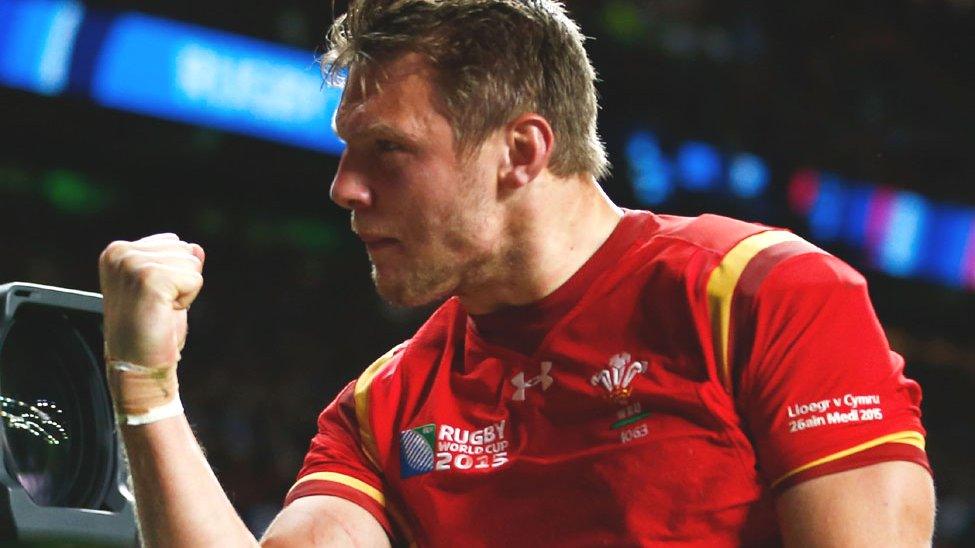 Dan Bigger does a clenched fist salute to the crowd after Wales' World Cup win over England