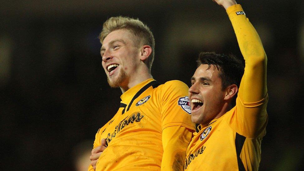 Oliver McBurnie celebrates his hat-trick