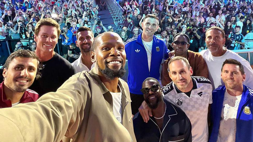 Kevin Durant taking a group selfie with celebrities at Fanatics Fest before the 2026 World Cup final