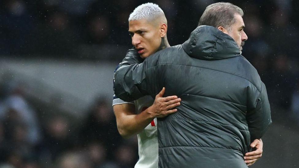 Richarlison embraced by Ange Postecoglou