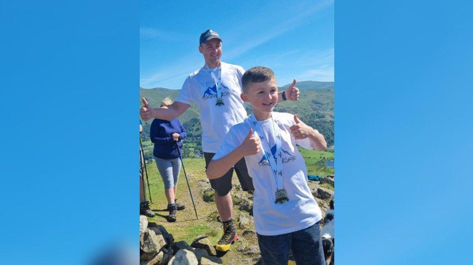 Leo and his dad Michael after climbing Silver How on Sudnay