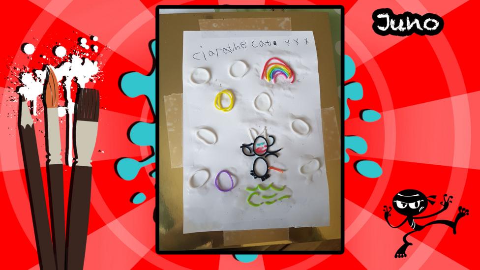 A picture of a cat made using plastic loom bands.