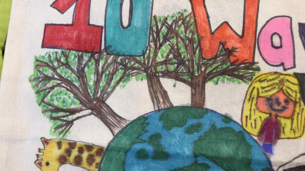 A close-up of the trees neatly drawn on the bag using felt tip.