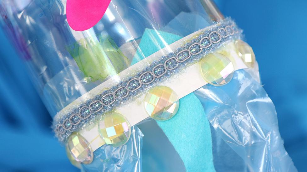 A close-up of the fabric trim and plastic jewels on Joe the jellyfish.
