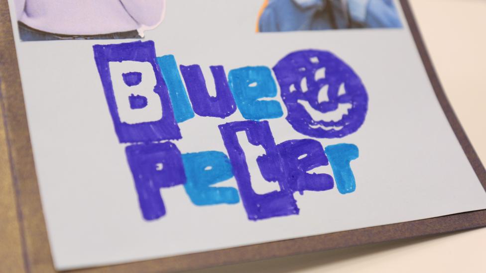 A close-up of the BP logo drawn with felt tip pens, on the front of the card.