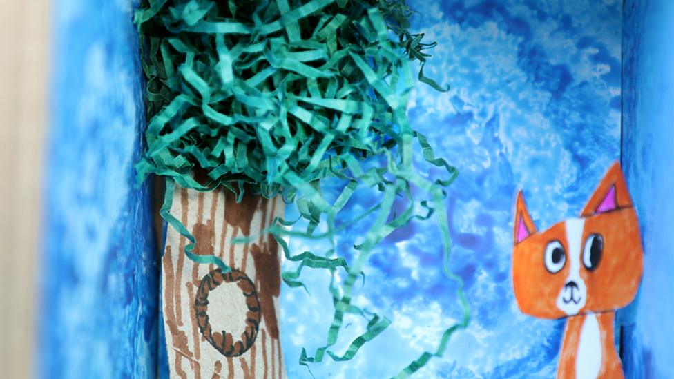 A close-up of the model tree, with green tissue paper used for leaves.