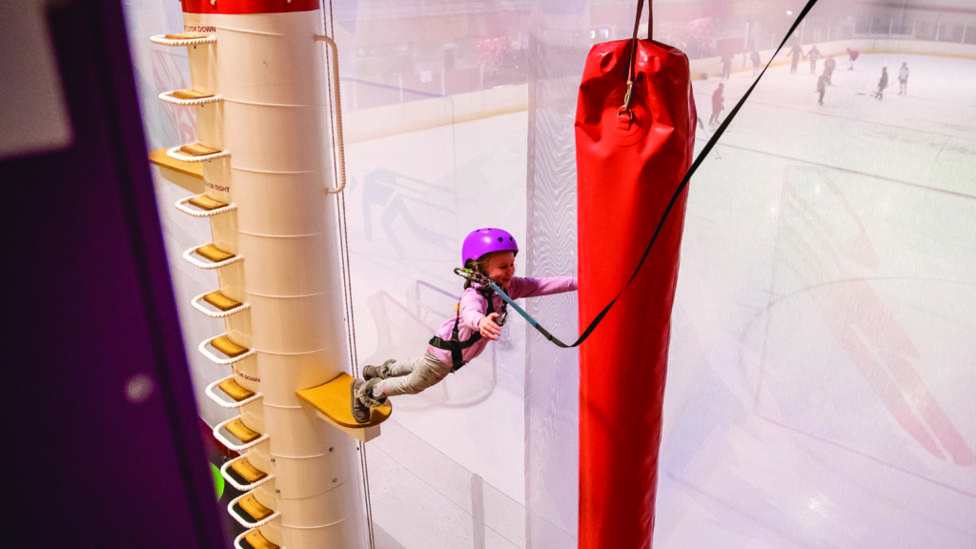 child-stepping-off-a-high-platform.