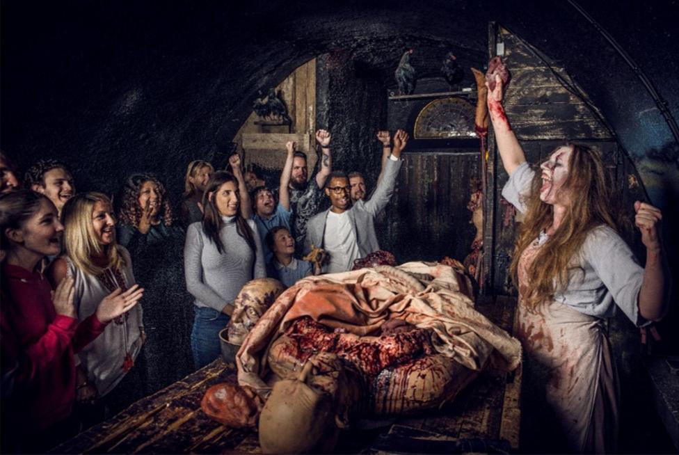 Visitors enjoy a gory scene at the London Bridge Experience