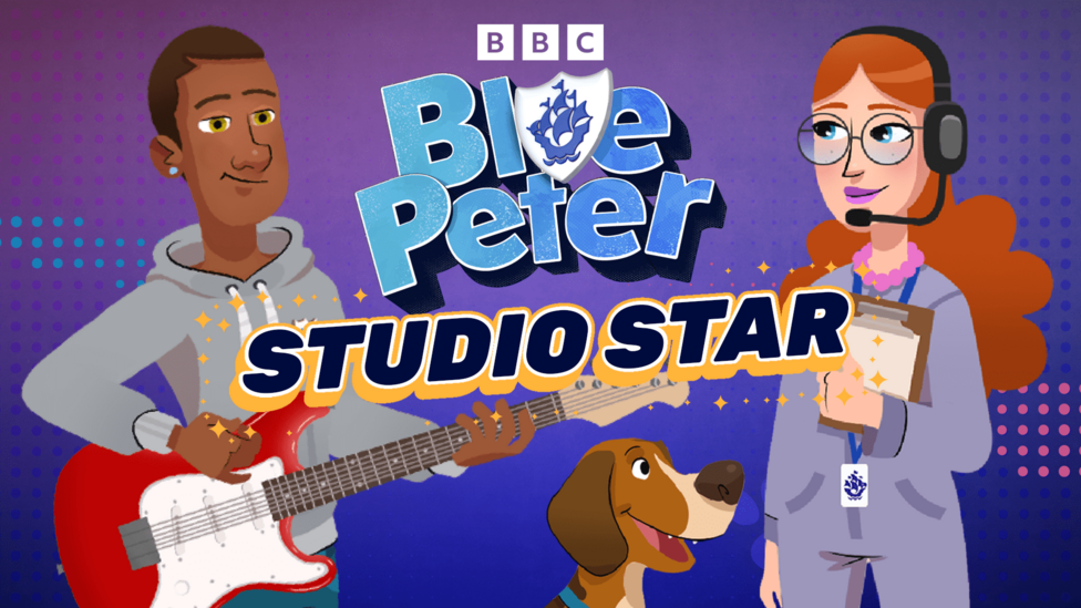 Text reads "Blue Peter: Studio Star". There is a black man in a gray hoodie holding a red guitar, a ginger white women holding a clipboard and henry the dog