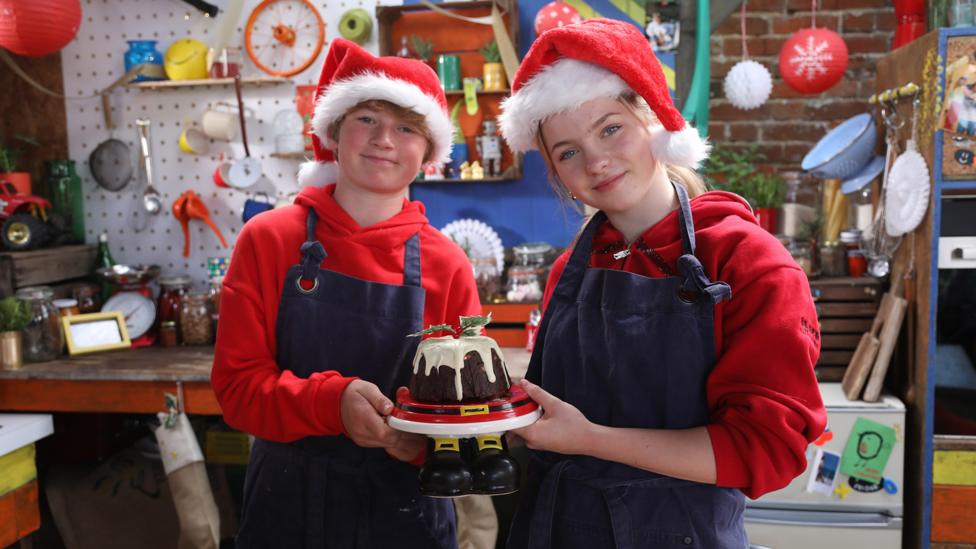 Cast of Cooking Buddies on CBBC make a Christmas pudding