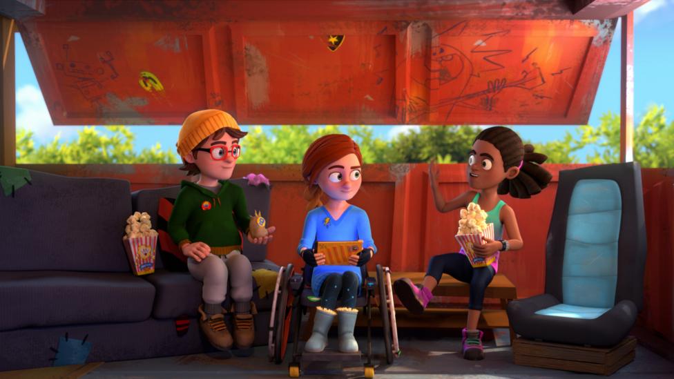 JJ, Ruby and Pieface from Dennis and Gnasher Unleashed sit in a rubbish container talking.