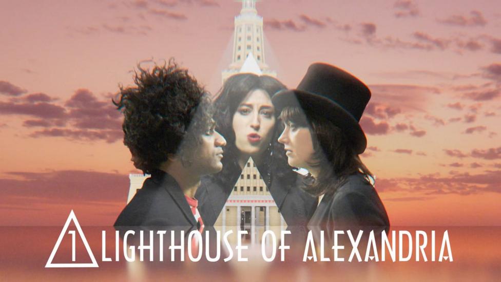 Singers next to the lighthouse of alexandrea
