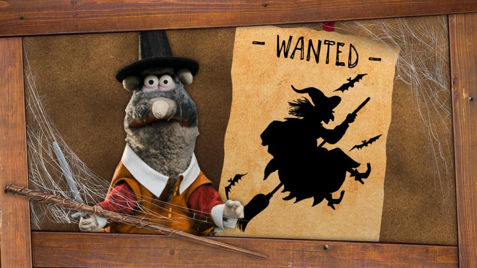 Rattus standing next to a poter saying "WANTED" above a picture of a witch