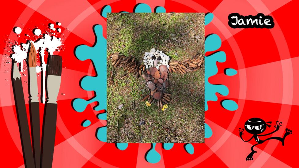 An owl made using sticks and foliage from a forest.