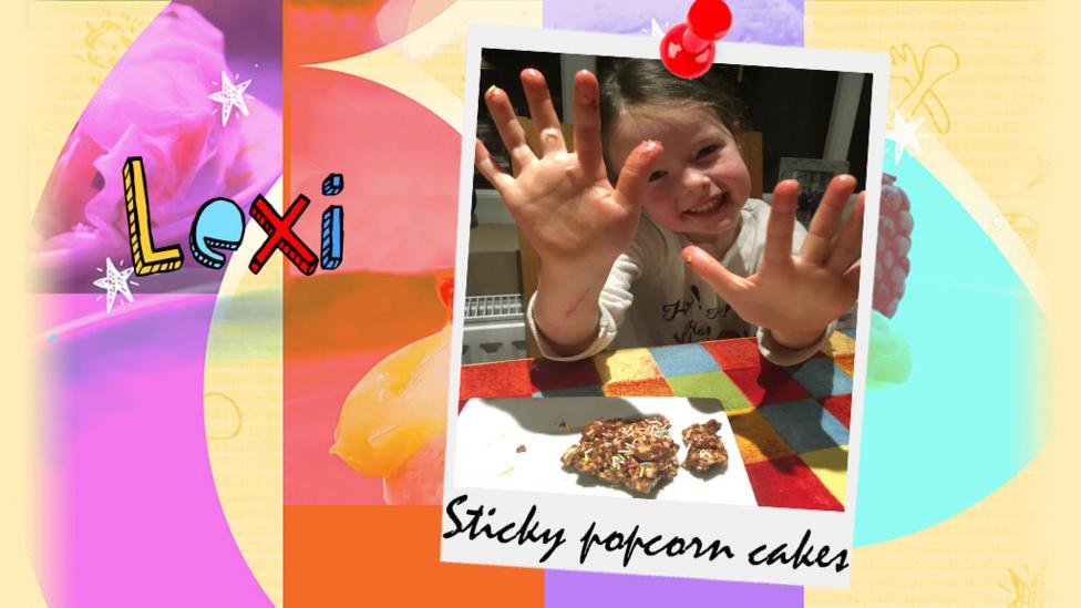 A girl holding a bowl of sticky popcorn cakes.