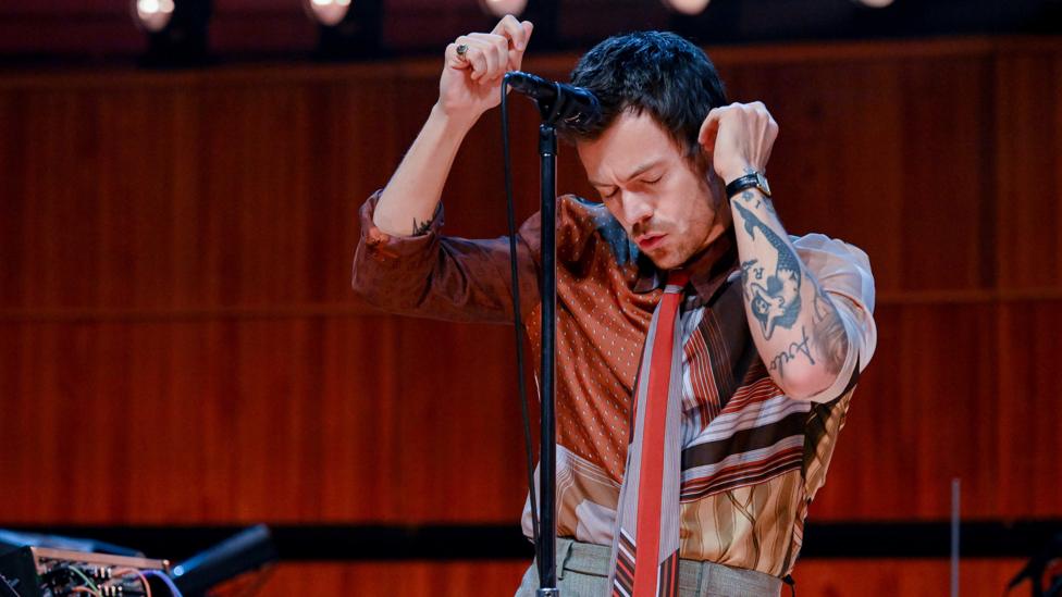 Harry Styles dancing in the Live Lounge.