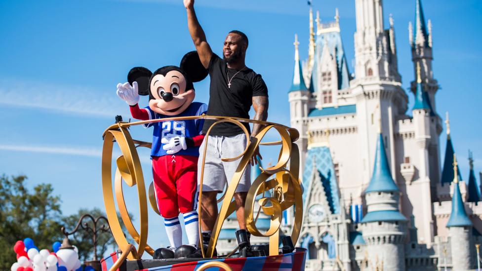 NFL Super Bowl star running back James White participates in the 'Going to Disney World' celebration parade down Main Street at Magic Kingdom Park on February 6, 2017.