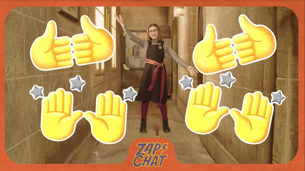 A young witch (Clarice) in Cackle's Academy uniform stands in a corridor over a broom stick on the ground.