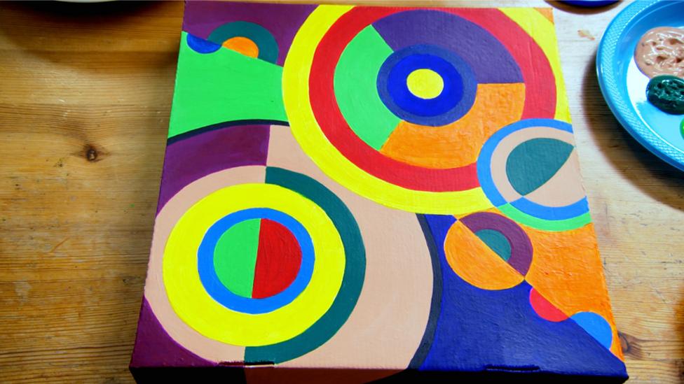 Abstract painting on a pizza box.